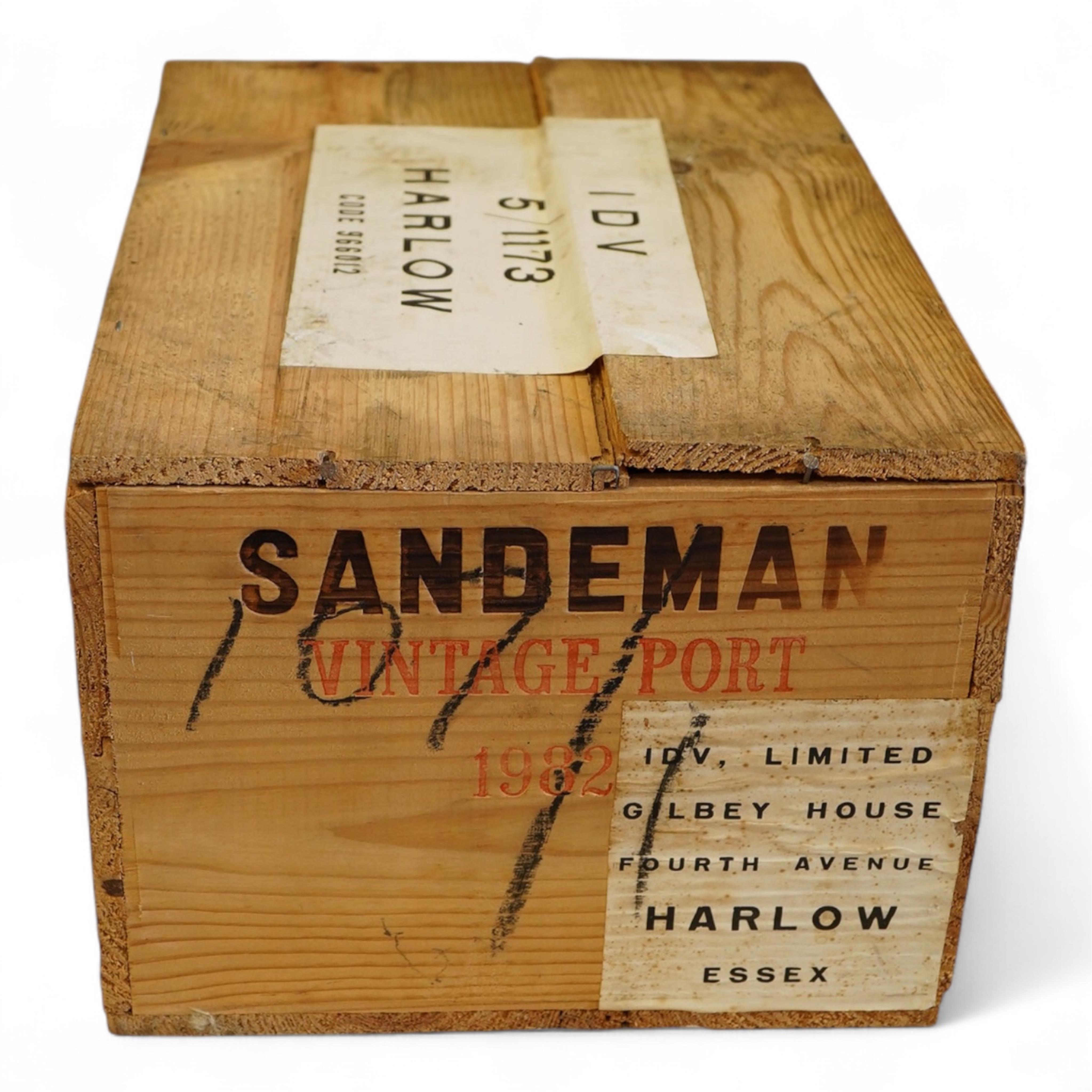 Twelve bottles of 1982 Sandeman vintage port (O.W.C)